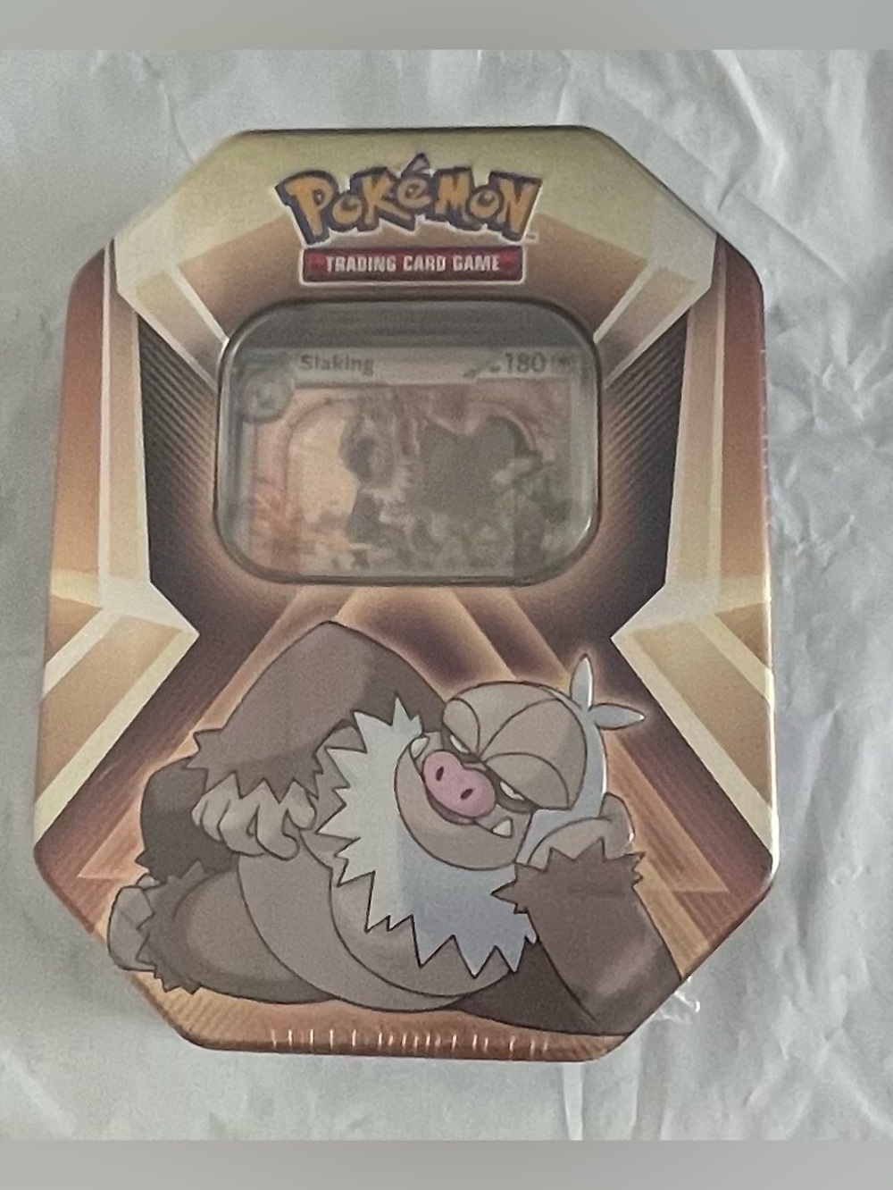 Pokemon Tin - Brown and Gold Slaking Art